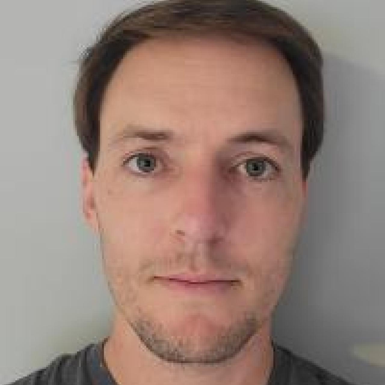 Headshot of Garrett Smith.
