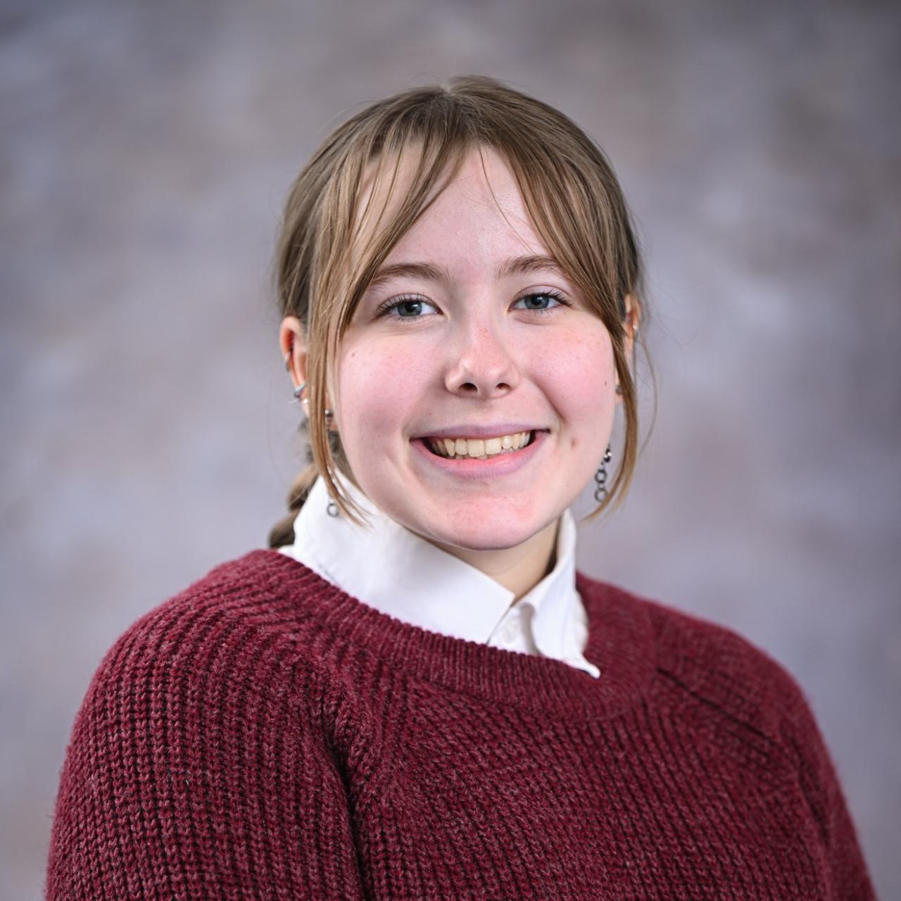 Liz posing for a headshot