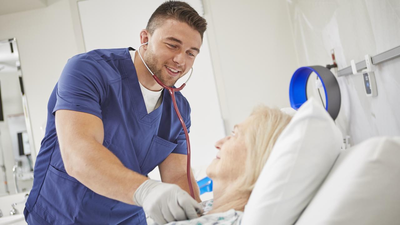 A physician providing care to a patient.